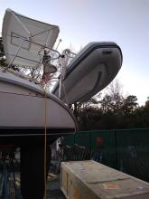 Dinghy hanging from new dinghy davits